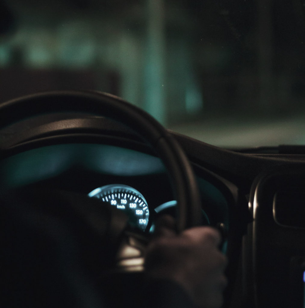 steering wheel and dashboard at night