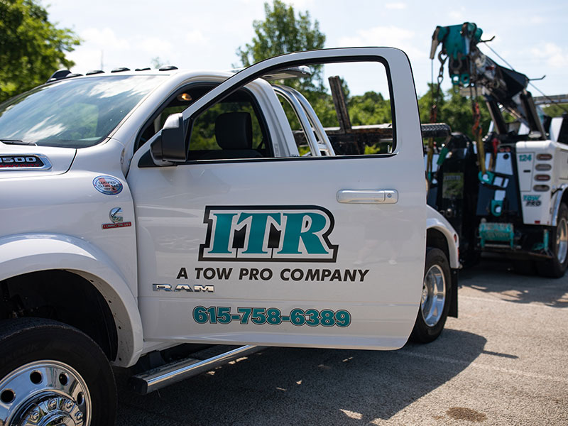Independent Towing & Recovery trucks providing roadside services